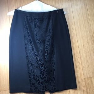 Ann Taylor black skirt with black leopard.  10